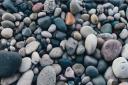 Removing pebbles from a beach can see offenders fined up to £1,000 as a penalty.