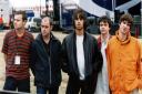 Oasis pictured August 9, 1996, ahead of their performances at Knebworth Park in Hertfordshire.