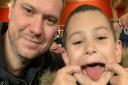Letchworth dad Dave Curran at the Arsenal match with his son Lennon, who has autism