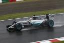 Lewis Hamilton on track at a wet Suzuka ahead of the 2015 Japanese Grand Prix [Picture: Mercedes-Benz]