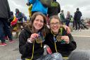 Laura Fairbanks and Paula Holm of North Herts Road Runners show off their Manchester Marathon medals. Picture: NHRR