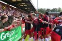 Stevenage players celebrate their first goal with the crowd. Picture: DAVID LOVEDAY/TGS PHOTO