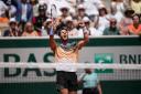 Cameron Norrie celebrates after beating Benoit Paire at the French Open (Christophe Ena/AP)