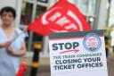 RMT union leaflets opposing plans to shut almost all UK railway ticket offices.