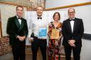 Mill Farm Eco Barns won the Ethical, Responsible and Sustainable Tourism Award. Left to right: Richard Turvill (sponsor - Swiss Camplings), Neil and Emma Punchard and Doug Muttitt (sponsor - Swiss Camplings)