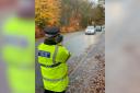 Police officers conduct speed checks