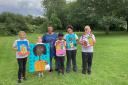 Artist Nadia Koo with pupils from Wimbish Primary Academy