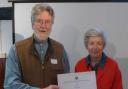 Philippa Parker receives her award from David Short, president of Hertfordshire Association for Local History.