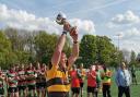Letchworth skipper Alex Amos lifts the Herts Presidents' Cup.
