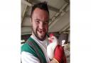 Co-Farmer Ed with one of the chickens at Church Farm Ardeley.