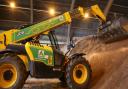 A digger picks up some salt ready to load onto a gritting truck at the Coreys Mill depot in Stevenage