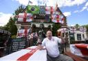 Landlord Norman Scott outside the Robin Hood pub in Jarrow ahead of the 2014 World Cup. Picture: OWEN HUMPHREYS/PA