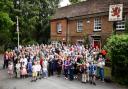 People celebrating the 40th anniversary of The Red Lion becoming a community-owned pub last year.