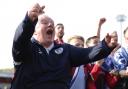 Steve Evans celebrates promotion from League Two against Grimsby Town last season. Picture: GEORGE TEWKESBURY/PA