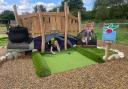 Willows staff member Charlotte does a final check of the Peter Rabbit Adventure Golf at Willows Activity Farm ahead of its opening day