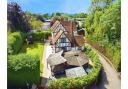 Broomin Green Farm, for sale with a guide price of £1,250,000, is of Tudor build with Victorian additions