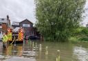 Woolgrove Road in Hitchin is flooded.