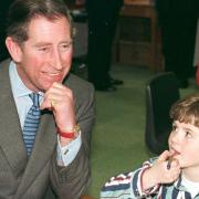 Charles III, then Prince of Wales, on a visit to the Purcell Music School in 1998