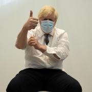 Prime Minister Boris Johnson gives a thumbs up after receiving his second jab of the AstraZeneca coronavirus vaccine, at the Francis Crick Institute in London, on Thursday June 3, 2021. Now the country hopes the PM will give the go ahead for Step 4 of