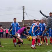 Hitchin Town fell to a 2-1 defeat away to Leiston in the Southern League Premier Division Central.