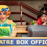 Aladdin pantomime stars Stuart Nurse and Steven Serlin answering calls at the Gordon Craig Theatre box office.