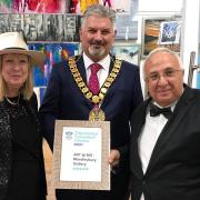 Marilyn Comparetto, Councillor Peter Hebden, and Ignazio Comparetto with the Travellers’ Choice Award certificate for Art @ MG at Mardleybury Farm, Datchworth.