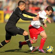 Jake Livermore in action for Tottenham against Luke Freeman of Stevenage in 2012. Picture: PA WIRE