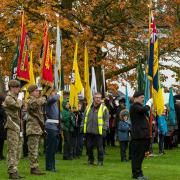 Standard-bearers gathered on the Bowling Green for the Service of Remembrance.