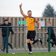 James Peters celebrates the opening goal for Stotfold against Biggleswade. Picture: PETER SHORT