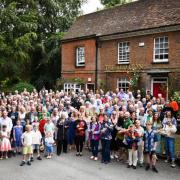 People celebrating the 40th anniversary of The Red Lion becoming a community-owned pub last year.