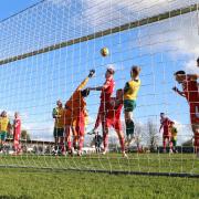 Hitchin Town put the Needham Market goal under pressure. Picture: PETER SHORT