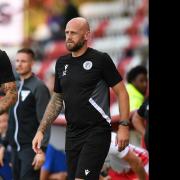 Manager Alex Revell and first-team coach Scott Cuthbert will have plenty to think about after defeat at Huddersfield. Picture: TGS PHOTO