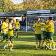 Hitchin Town celebrate Coree Wilson's penalty. Picture: PETER ELSE