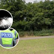 A 23-year-old man has been arrested after being found in possession of £800 and cocaine while hiding in a bush.