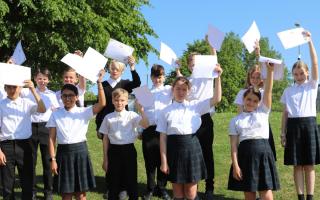 Pupils at Fearnhill School with their certificates after their poems were selected for publication in an anthology.