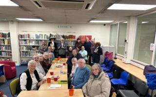 Ken Follett joins readers at Stevenage library's 'Tea & Chat' event.