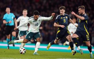 Jamie Reid shoots for Northern Ireland against Scotland. Picture: ANDREW MILLIGAN/PA