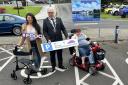 Misuse of Blue Badge parking spaces will be tackled through Fermanagh and Omagh District Council's 'Be Kind, Park with Disability in Mind' campaign. Pictured (L-R) are volunteer Hayley Aspinall, council chair John McClaughry, and volunteer Eileen Drumm