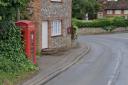 The phone box on Anmer Road at Flitcham, which is one of those up for adoption