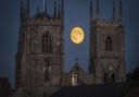 The full moon over King's Lynn Minster. This month's is called the Pink Moon.