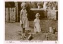 Princesses Elizabeth (later Queen Elizabeth II) and Margaret playing in the sandpit at St Paul's Walden Bury in Hertfordshire.