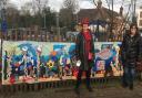 Gilly Chegwyn and Glenda Dixon show off their seascape outside Letchworth train station