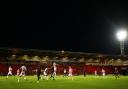 Steve Evans had to view the action from the back of the stand at Doncaster Rovers. Picture: ISAAC PARKIN/PA