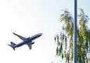 A Ryanair flight departs from Luton Airport on the Bedfordshire and Hertfordshire border.