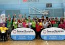 The Power House Games in Cambridge, including Willmott Dixon's Natalie Sidey (left, pink shirt) and Power2Inspire founder and chief ambassador John Willis (centre, red shirt)