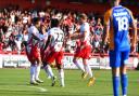 Elliott List and Stevenage celebrate their winner against Shrewsbury Town. Picture: TGS PHOTO