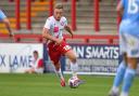 Harvey White got a late consolation for Stevenage from the penalty spot at Huddersfield. Picture: TGS PHOTO