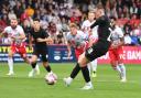 Jack Moylan scores the winning goal for Lincoln from the penalty spot at Stevenage. Picture: TGS PHOTO