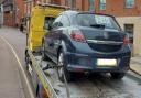 Police seized a car in Hitchin after arresting the driver on suspicion of shoplifting and driving without insurance.