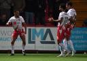 Louis Thompson and Stevenage celebrate his goal against Wrexham. Picture: TGS PHOTO